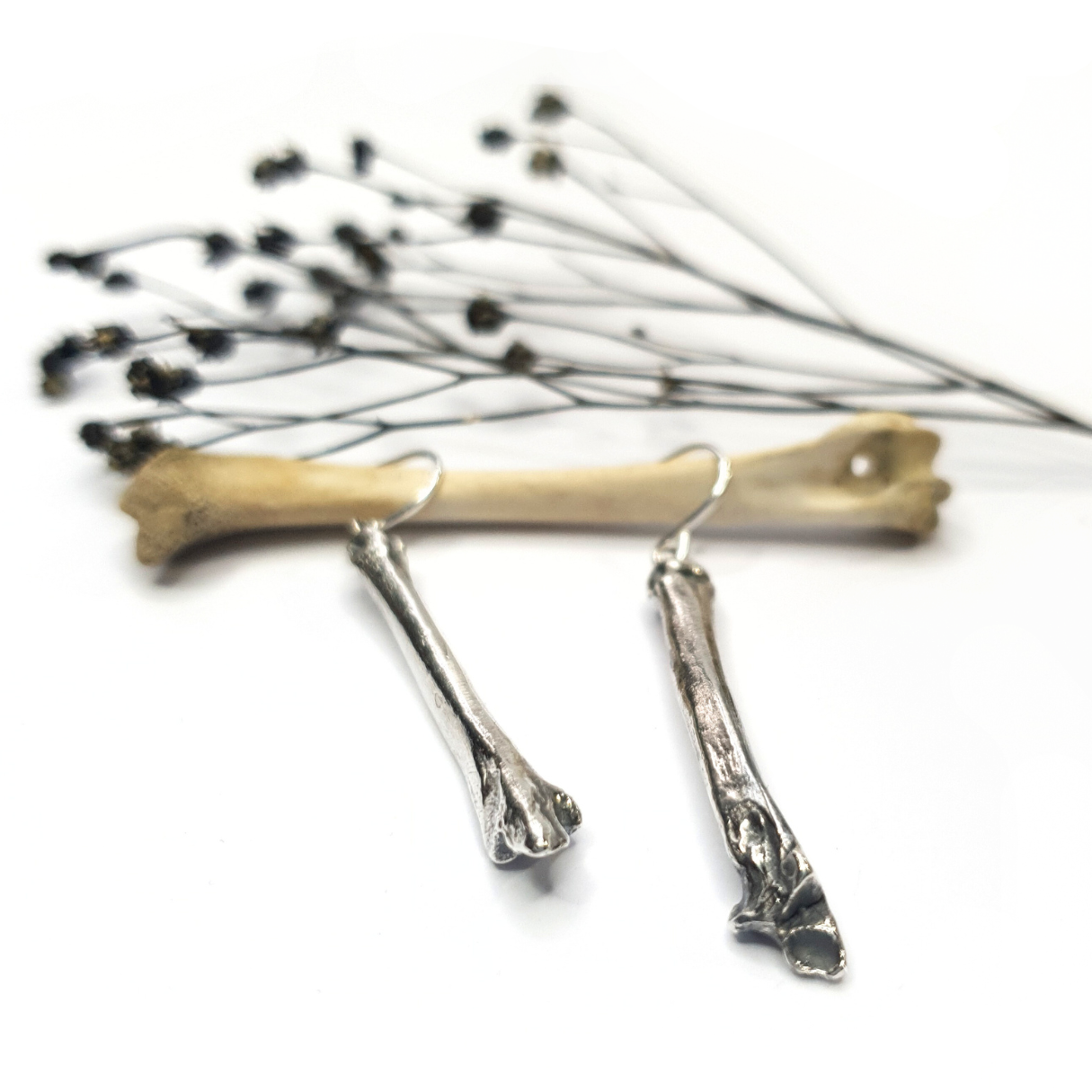 Ossium Dangly Earrings